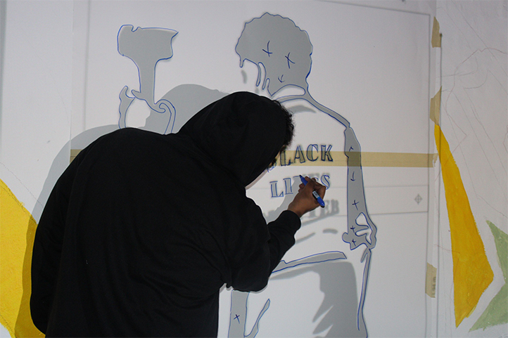 Colectivo Naranjas y Limas presenta mural sobre luchas sociales en FILU 2026